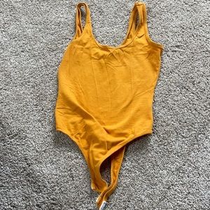 Burnt orange color bodysuit